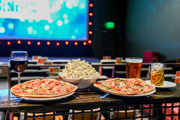 Good Food & Drinks at your table in the Theater!
